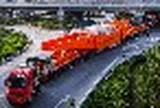 Phát hiện đoàn xe tải Trung Quốc ‘dính liền nhau’ dài gần 100 mét, liên tục di chuyển với tốc độ 5km/h, đang thực hiện nhiệm vụ đặc biệt