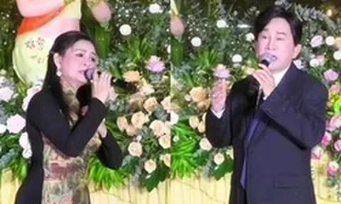 Cặp vợ chồng NSƯT bỏ ô đứng hát giữa trời mưa lớn, nói thẳng 1 điều