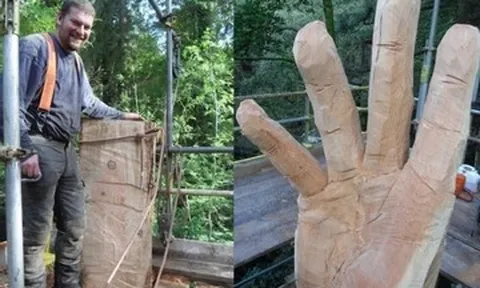 Người đàn ông biến cây cổ thụ bị bão quật ngã thành bàn tay cao 15m