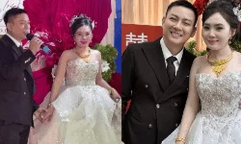 Biểu cảm lạ của Ngọc Trinh trong đám cưới với Hoài Lâm
