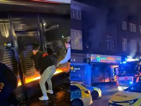 Nhờ người dân cạy cửa cuốn, người đàn ông thoát chết, bò ra từ biển lửa